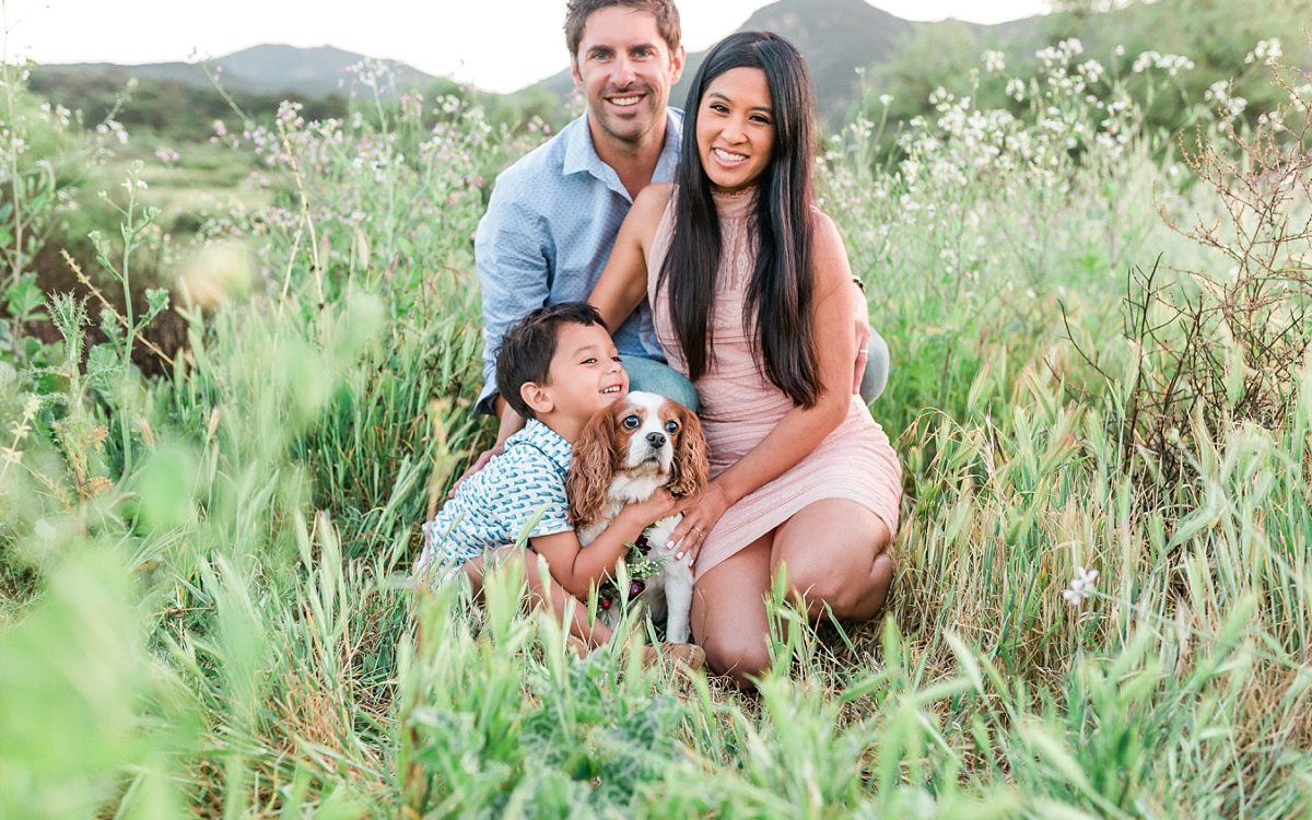San Diego Family Photographer | Beautiful and joyful family portrait session with King Charles Spaniel dog in a Mission Trails Park meadow